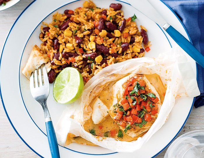Mexican fish parcels with rice and beans